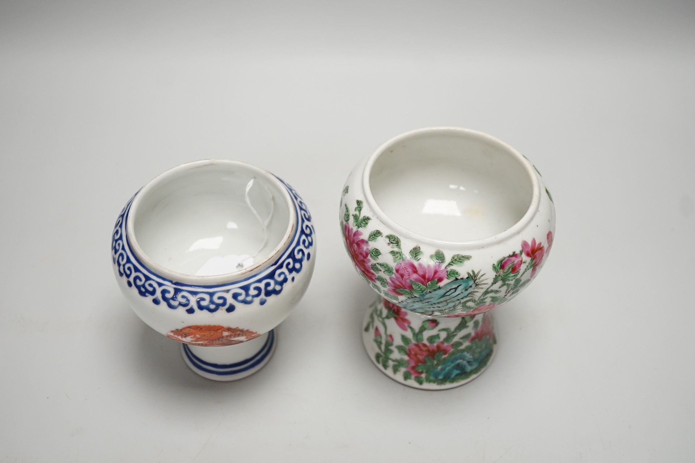 Two 19th century Chinese porcelain stem cups, The first decorated with Dragon medallions, the second with peonies and rock work, tallest 13.5cm